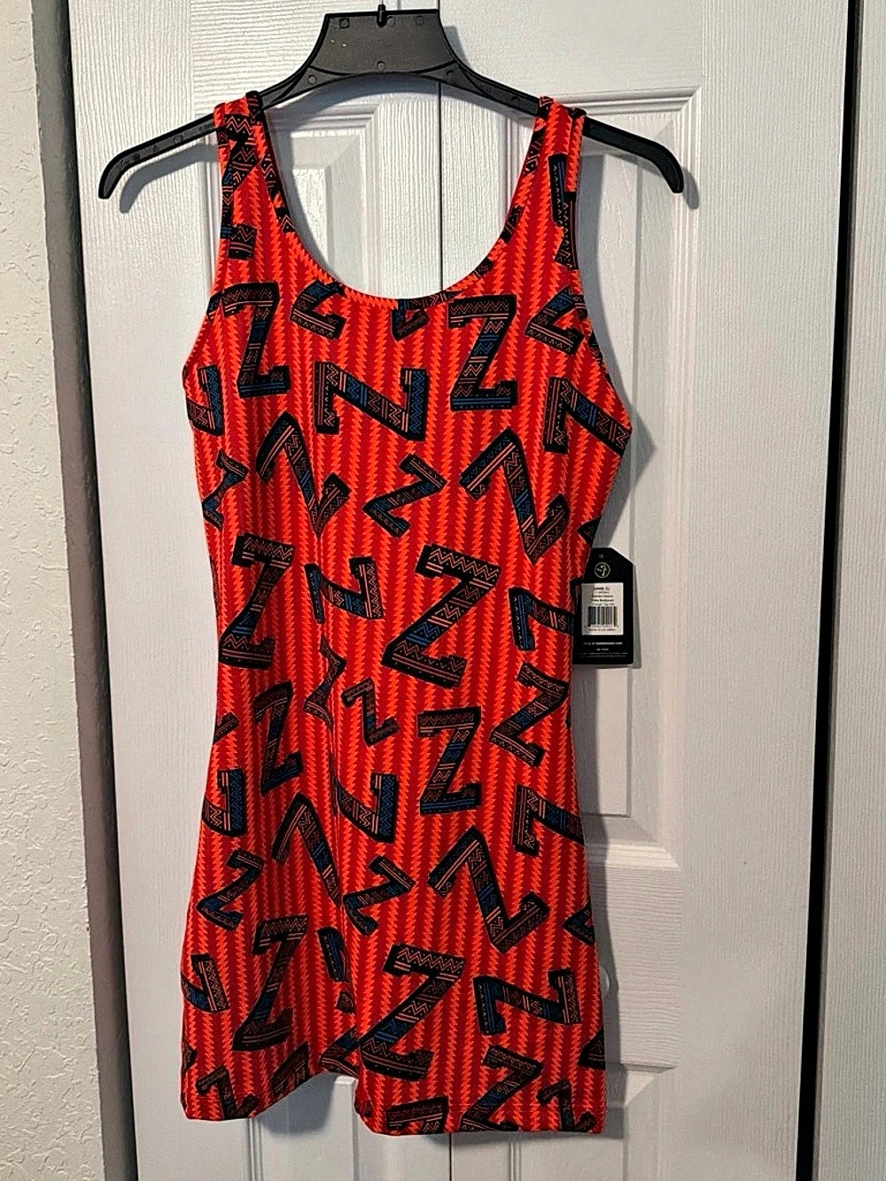 Zumba Tribe Bodysuit Geometric Orange & Black NWT Medium